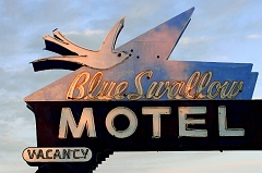 094 Motel Sign, Tucumcari, NM -- Yeah, I SHOULD have shot the neon during the night, but that would have pulled me away from the watching the car.