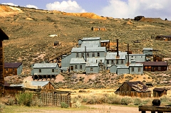 454 Standard Mill at Bodie Ghost Town, Bodie, CA -- In it's heyday, the mill processed more than $14 million worth of gold and silver in 25 years. In 1898 the original mill burned down (it was built of mostly wood, while this one is framed in wood, but mostly covered with sheets of corrugated steel,) but was rebuilt by the following year.